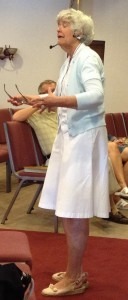 Susan preaching in Redwood Falls.