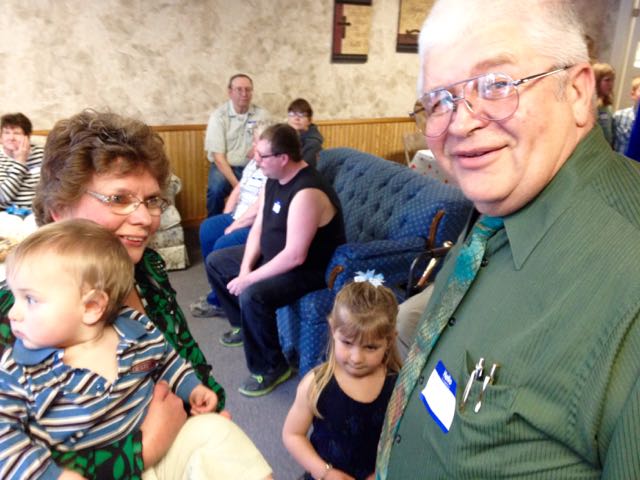 Pastor Wayne and Kathy Thom with their grandchildren.