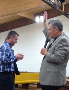 Ministering healing at Kalona, Iowa.